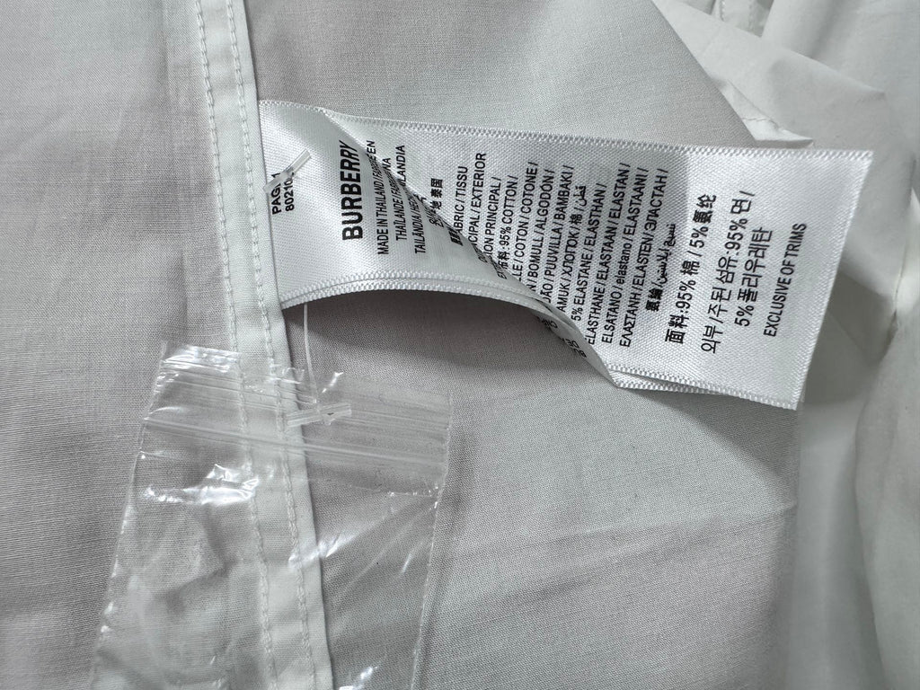 Burberry shirt care label inside collar, printed fabric content text