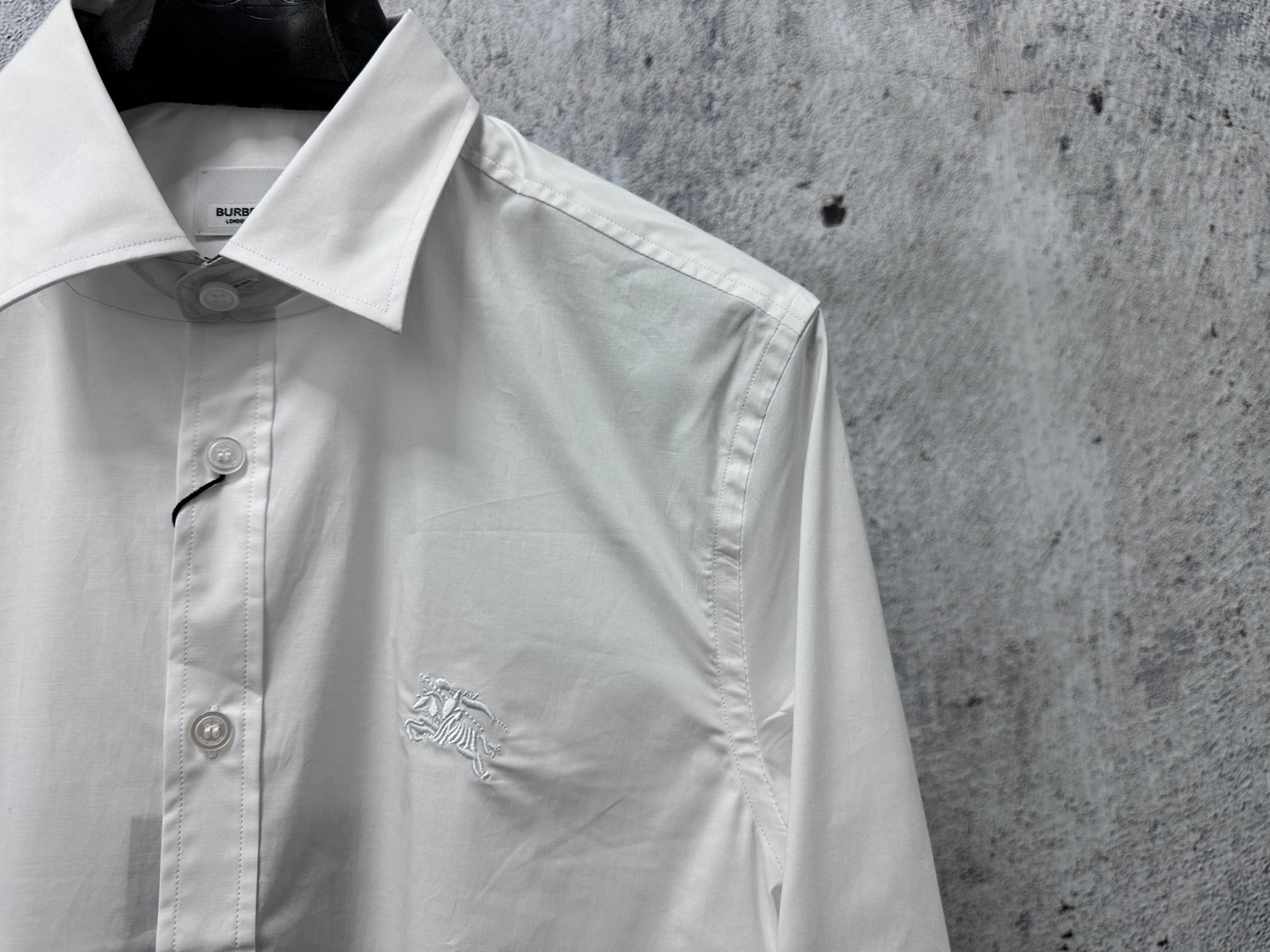 Burberry long-sleeve shirt, white, chest area with button and logo detail