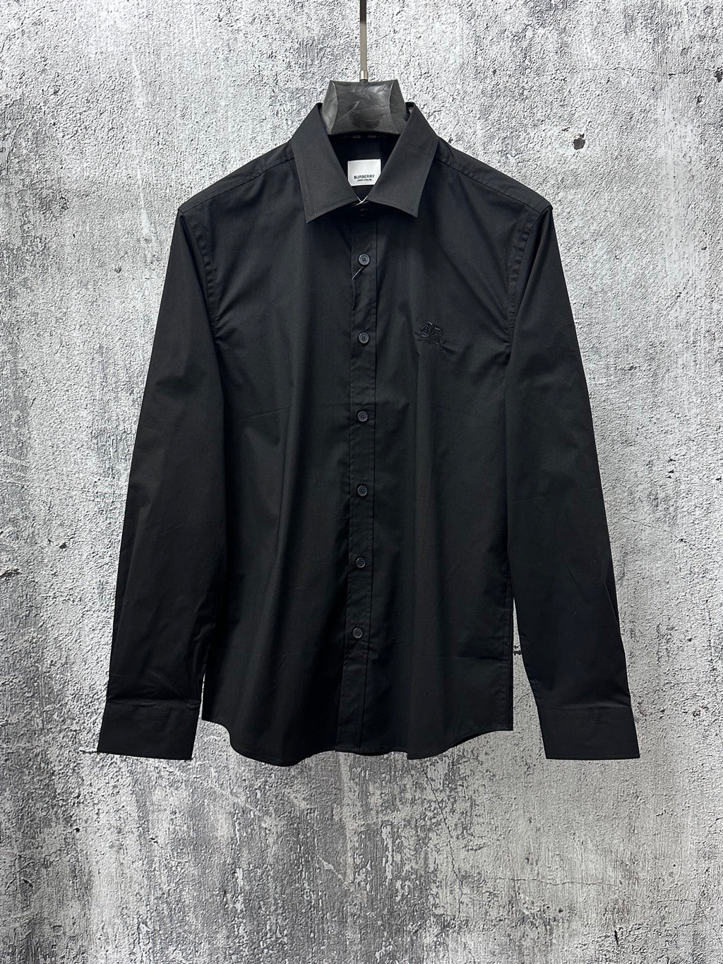 Burberry dark long-sleeve button-up shirt with pointed collar and chest pocket