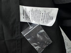 Burberry shirt label tag and buttons on inner placket, dark fabric