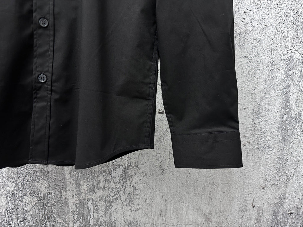 Burberry long-sleeve shirt, dark black, side view with buttoned cuffs