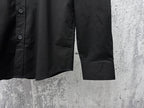 Burberry long-sleeve shirt, dark black, side view with buttoned cuffs