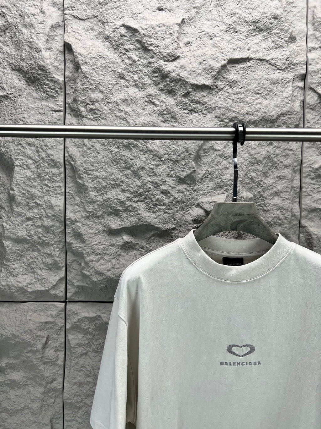 Balenciaga short-sleeve T-shirt in white with chest heart logo, close front view