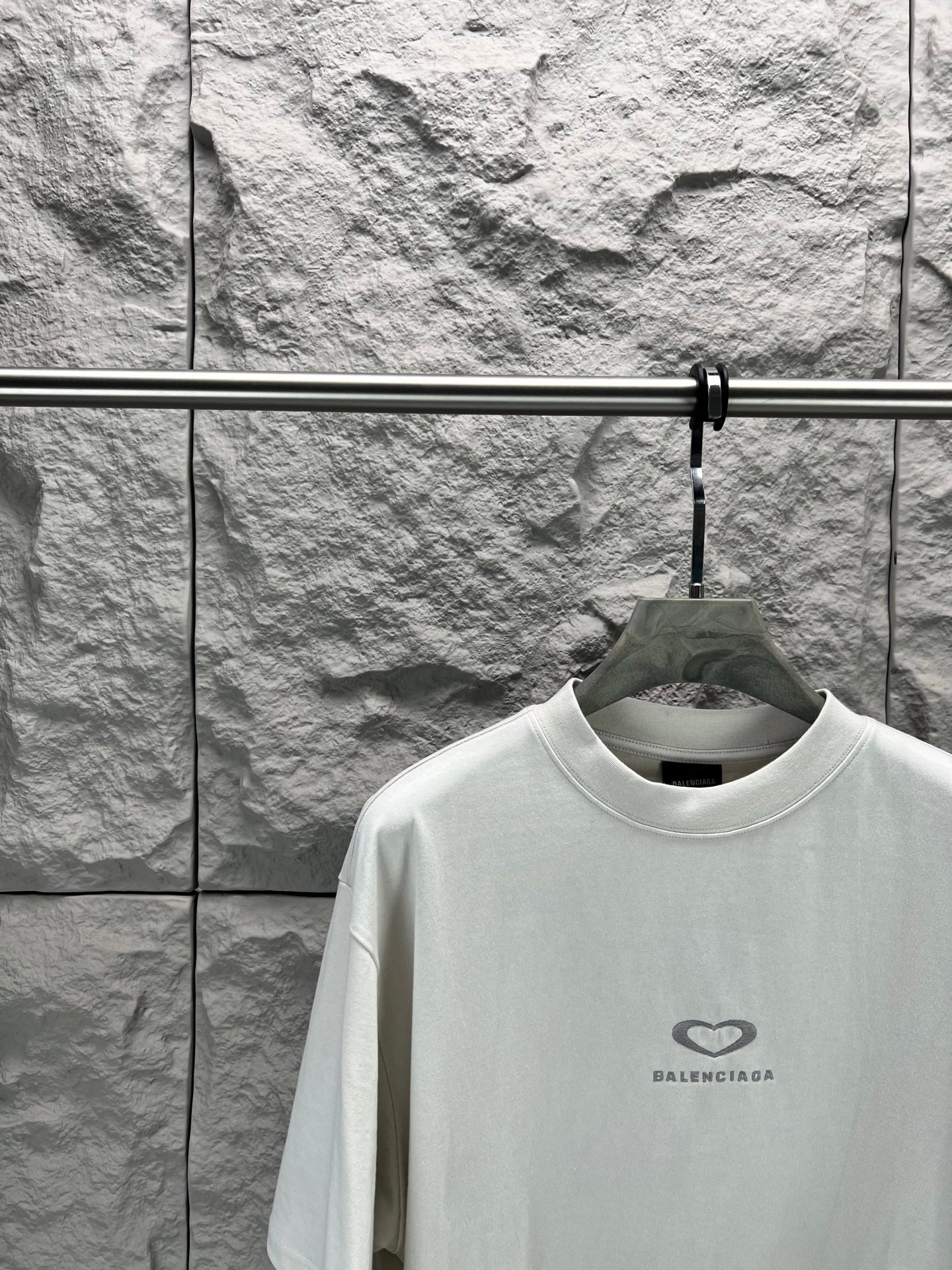 Balenciaga short-sleeve T-shirt in white with chest heart logo, close front view