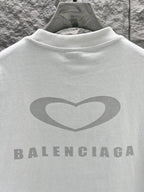 Balenciaga back logo on a white short-sleeve T-shirt with large heart and brand text