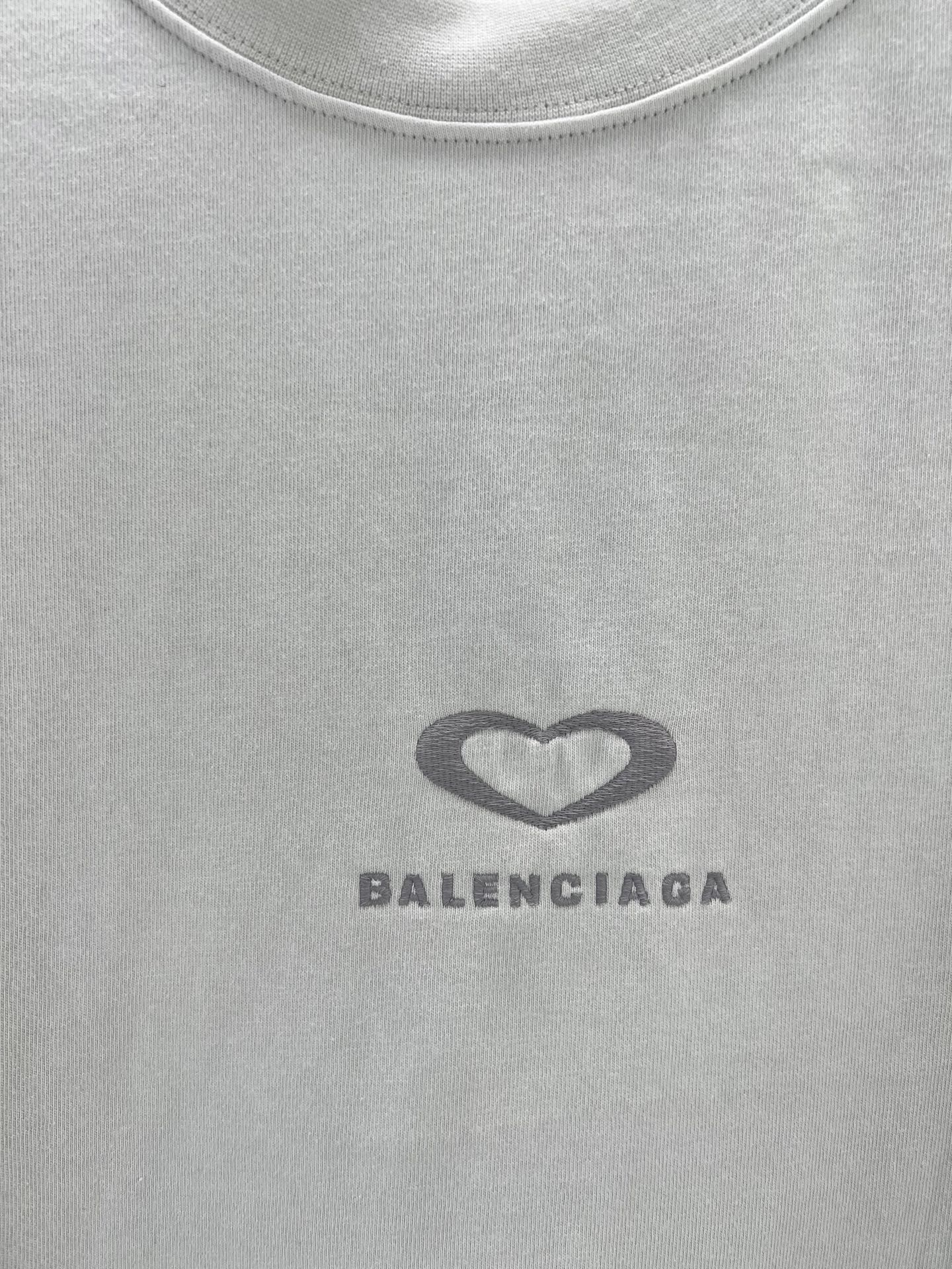 Balenciaga chest logo on a white short-sleeve T-shirt, heart icon and brand text