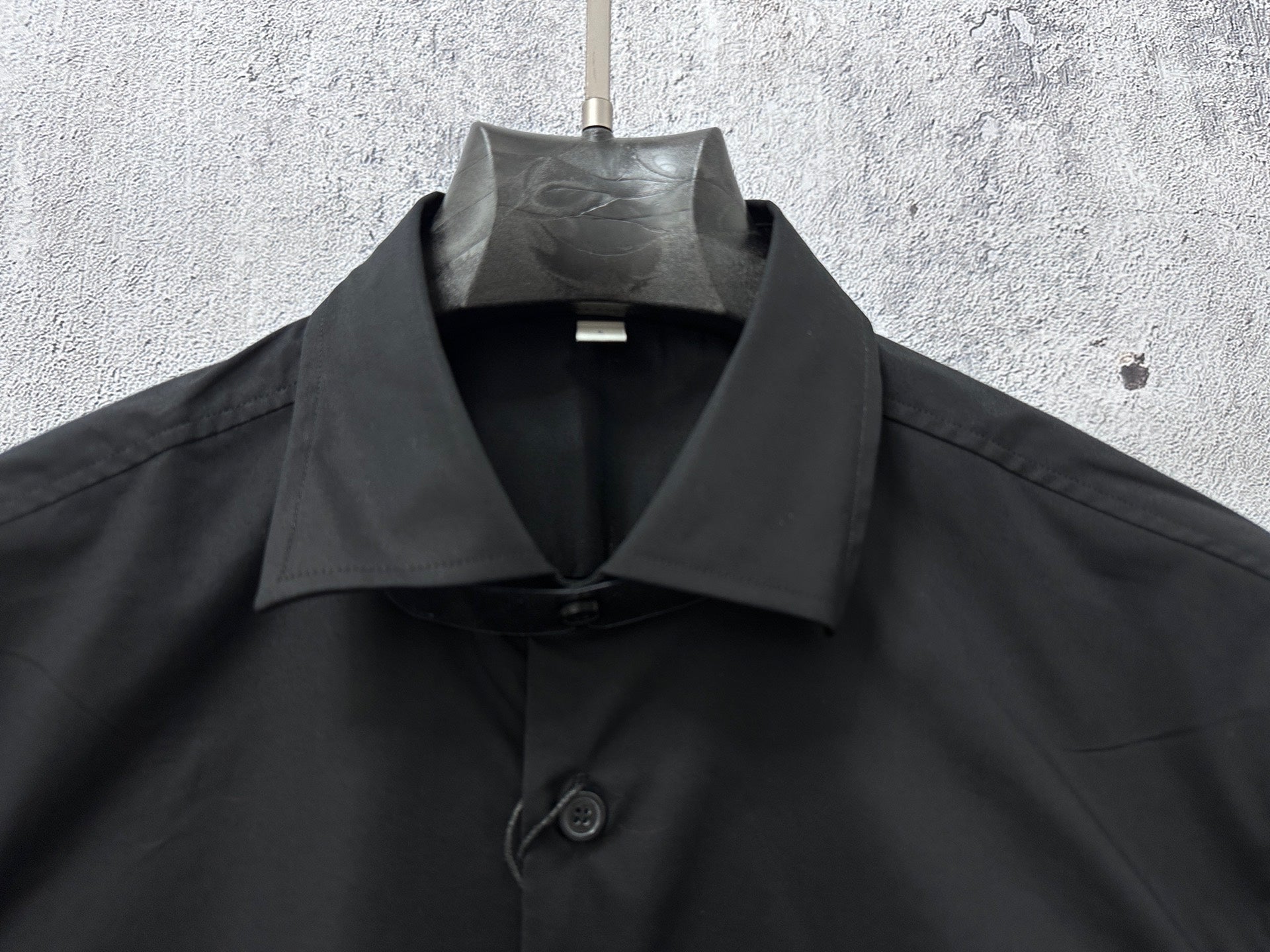 Burberry black button-front shirt collar and placket detail