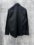 Burberry long-sleeve button-up shirt, black, back view with collar and button closures