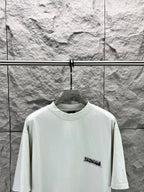 Light mint Balenciaga T-shirt with small side logo and crew neck