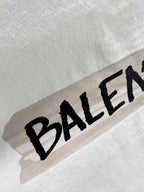 Black Balenciaga logo print on light mint T-shirt fabric