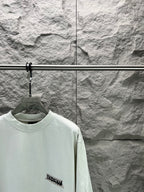 Light mint Balenciaga T-shirt with small logo on front and crew neck
