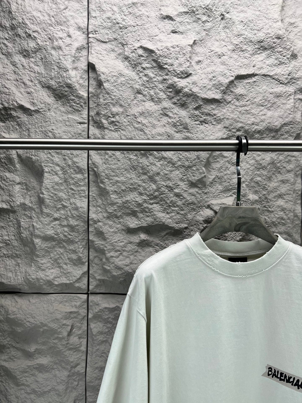 Light mint T-shirt with crew neck and small Balenciaga logo on sleeve