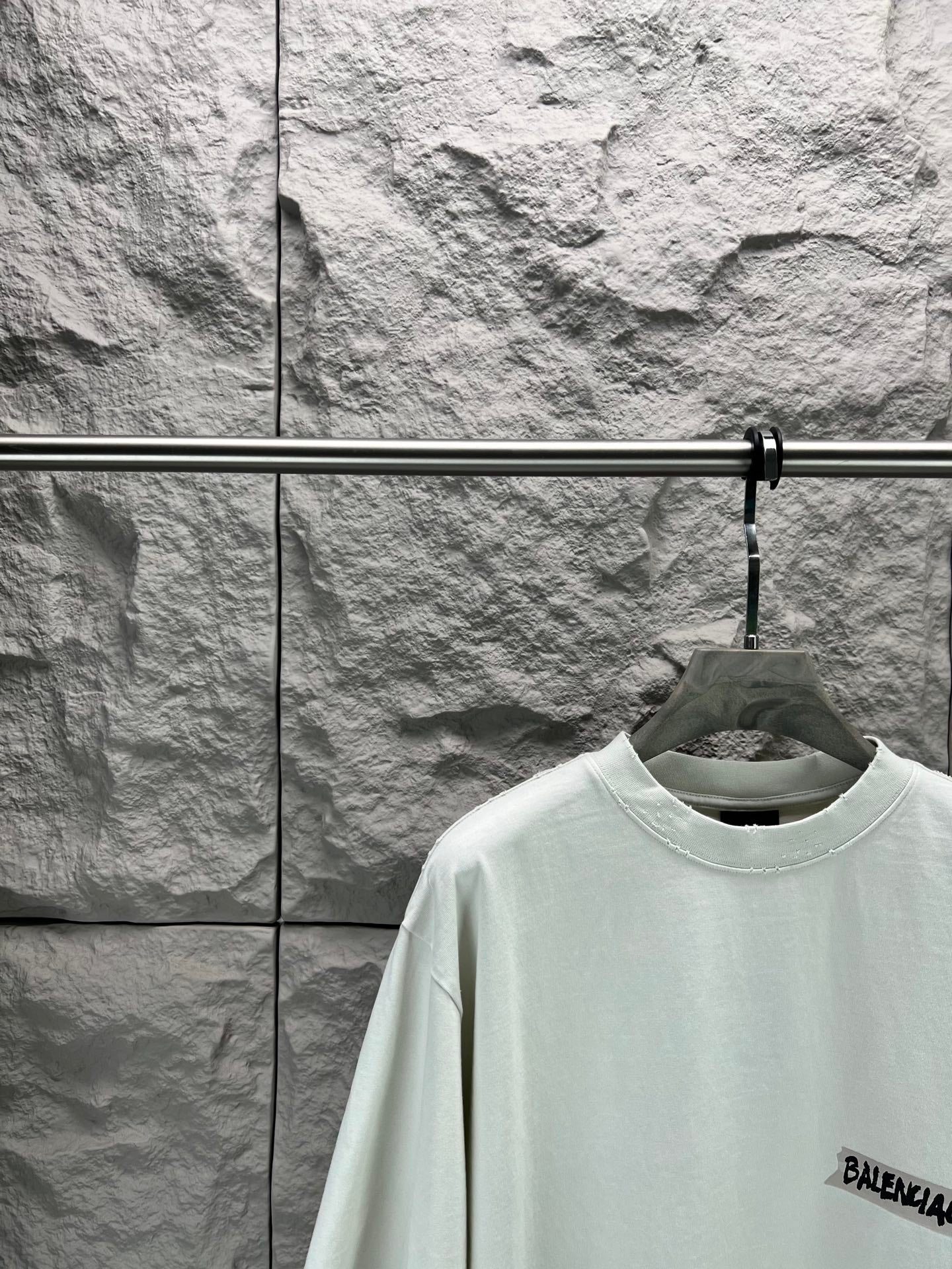 Light mint T-shirt with crew neck and small Balenciaga logo on sleeve