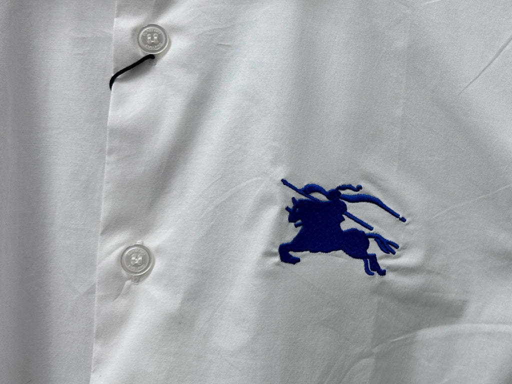 White shirt front with button placket and embroidered blue horse logo