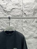Dark charcoal T-shirt with small Balenciaga chest logo patch