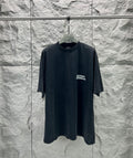 Dark charcoal Balenciaga logo T-shirt with short sleeves and crew neck