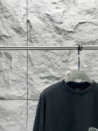Dark charcoal T-shirt crew neck with ribbed collar and small logo detail