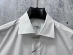 Long-sleeve button-up shirt collar, white, with inner neck tag and front button