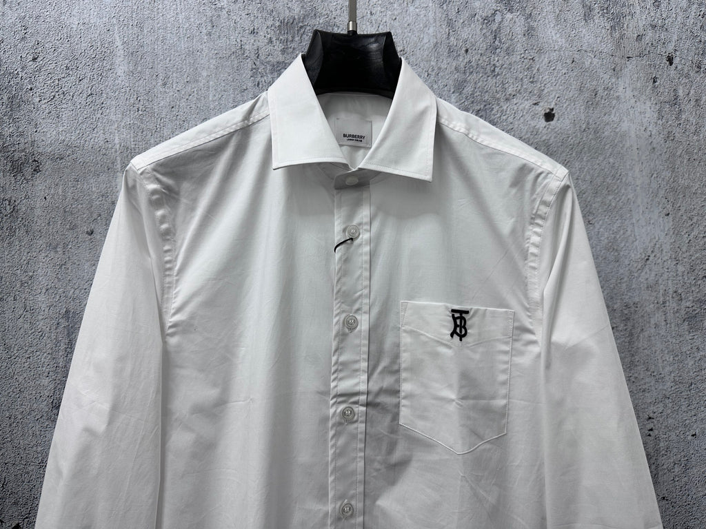 Burberry long-sleeve button-up shirt, white, front view with TB logo