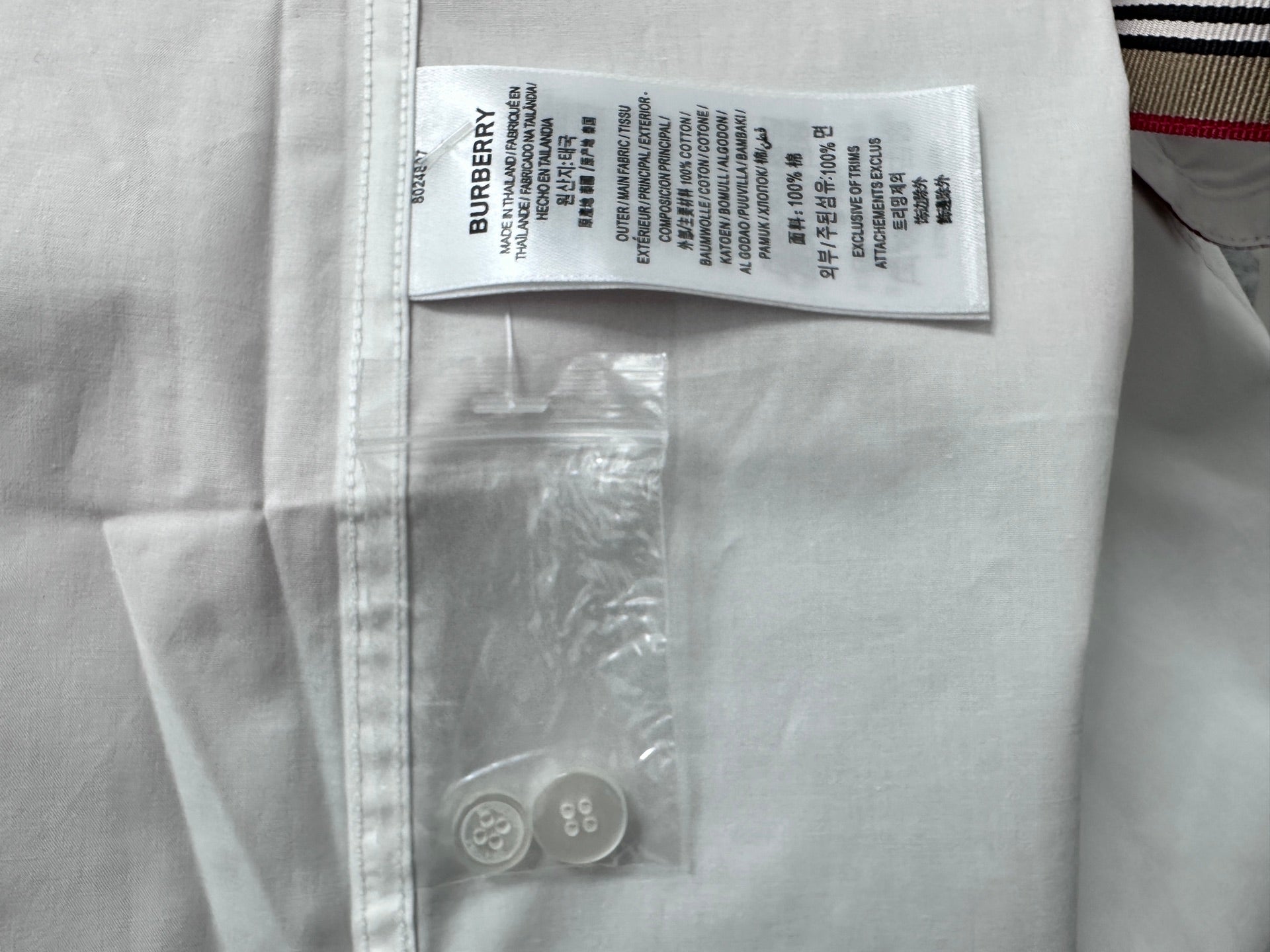 Burberry long-sleeve shirt, white, interior care label with buttons