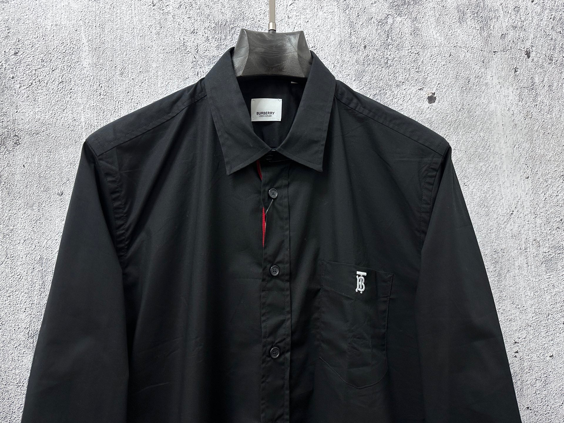 Burberry long-sleeve shirt front view with chest pocket and logo