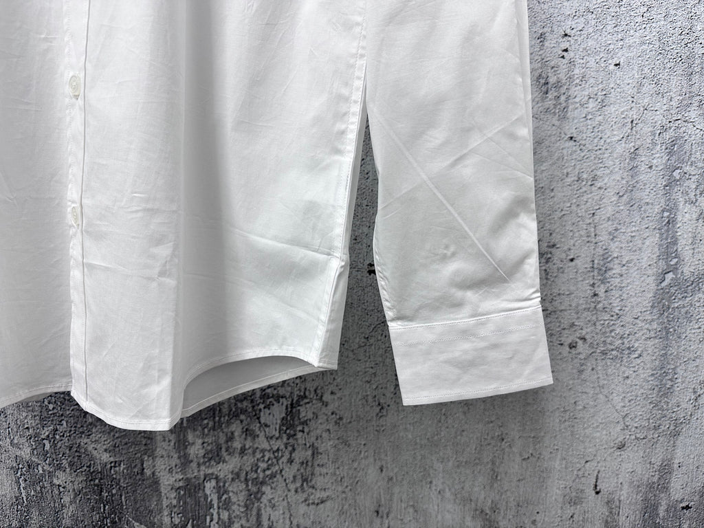 Burberry white dress shirt front with long sleeves and curved hem
