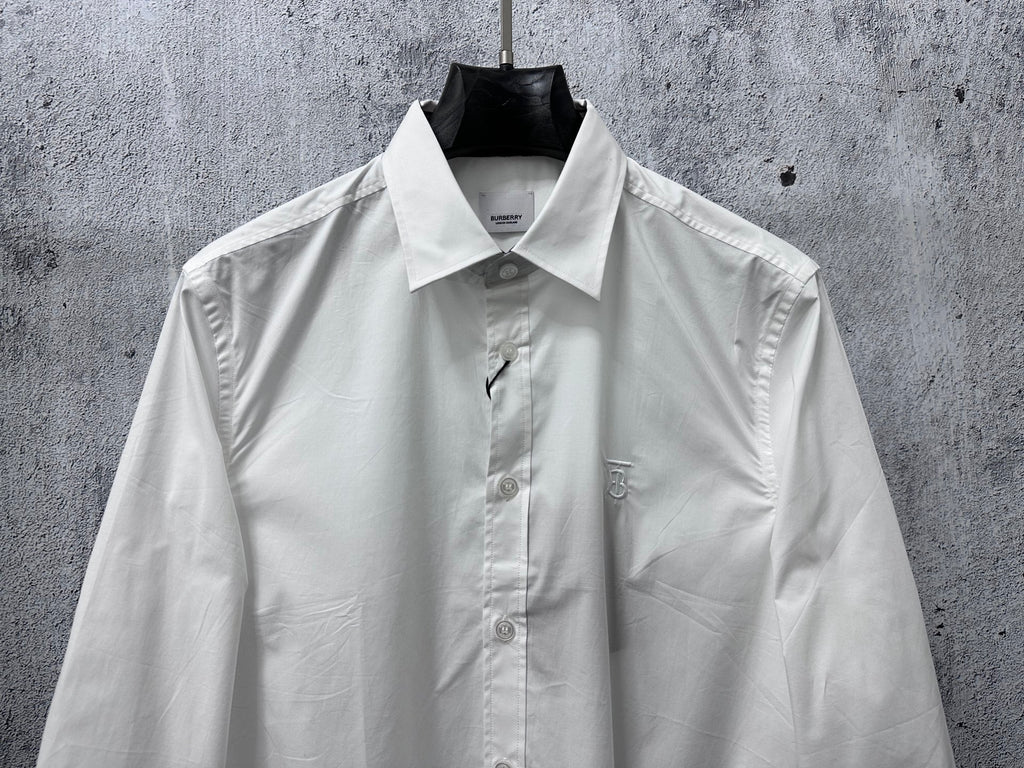 Burberry white long-sleeve button-up shirt with pointed collar and chest monogram