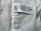 Burberry shirt size label with plastic-wrapped spare buttons on placket