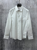 Burberry white long-sleeve button-up shirt with pointed collar and front buttons