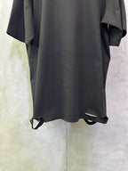 Black Balenciaga T-shirt hem and sleeves, front graphic partially visible