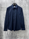 Navy long-sleeve button-up shirt, front button placket and chest logo