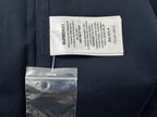 Burberry size and care label inside navy shirt with barcode tag