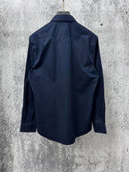 Navy long-sleeve button-up shirt, back view with yoke and seam details