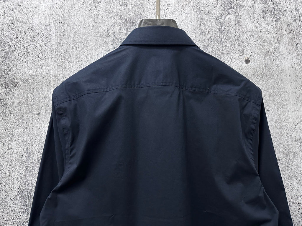 Navy long-sleeve button-up shirt back with yoke and seam details