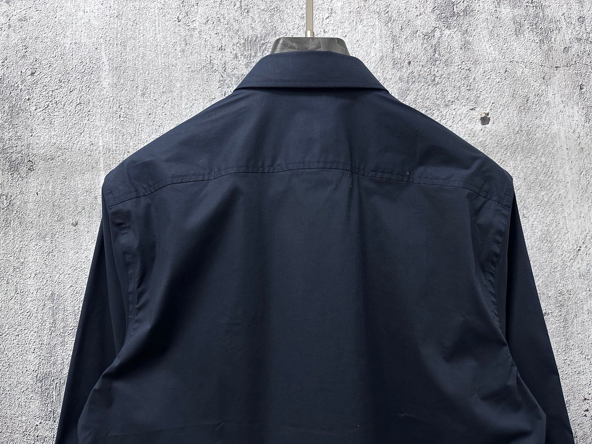 Burberry long-sleeve shirt back, dark navy with yoke seam and center pleat