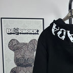 Black Prada hoodie with drawstring hood and white-and-black graphic detail
