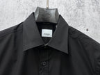 Burberry long-sleeve shirt in black, collar and button placket close-up