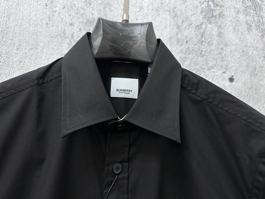 Black Burberry button-up shirt collar with front button placket