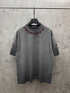 Grey short-sleeve T-shirt with maroon embroidered chest graphic and neckline logo patch
