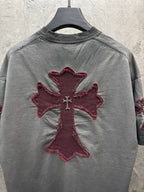 Gray short-sleeve T-shirt with burgundy cross graphic patch centered on back