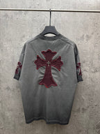 Gray short-sleeve T-shirt with burgundy cross graphic patch on back