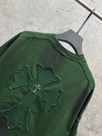 Green short-sleeve T-shirt close-up of back with embroidered angel cross applique