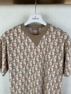 Tan Dior short-sleeve top with V-neck and allover logo print