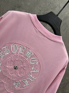 Pink short-sleeve T-shirt close-up of large back circular embroidered design