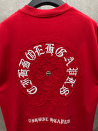Red short-sleeve T-shirt with large back circular embroidery and text
