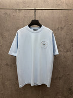 Light blue crewneck short-sleeve T-shirt with small embroidered logo on chest