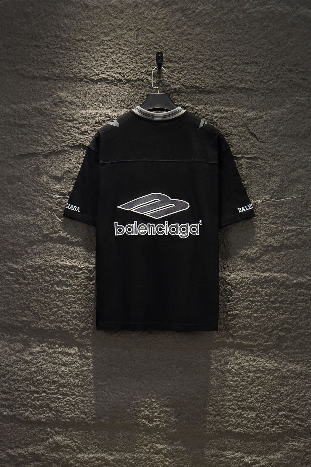 Balenciaga black short-sleeve polo shirt with front logo and sleeve logos