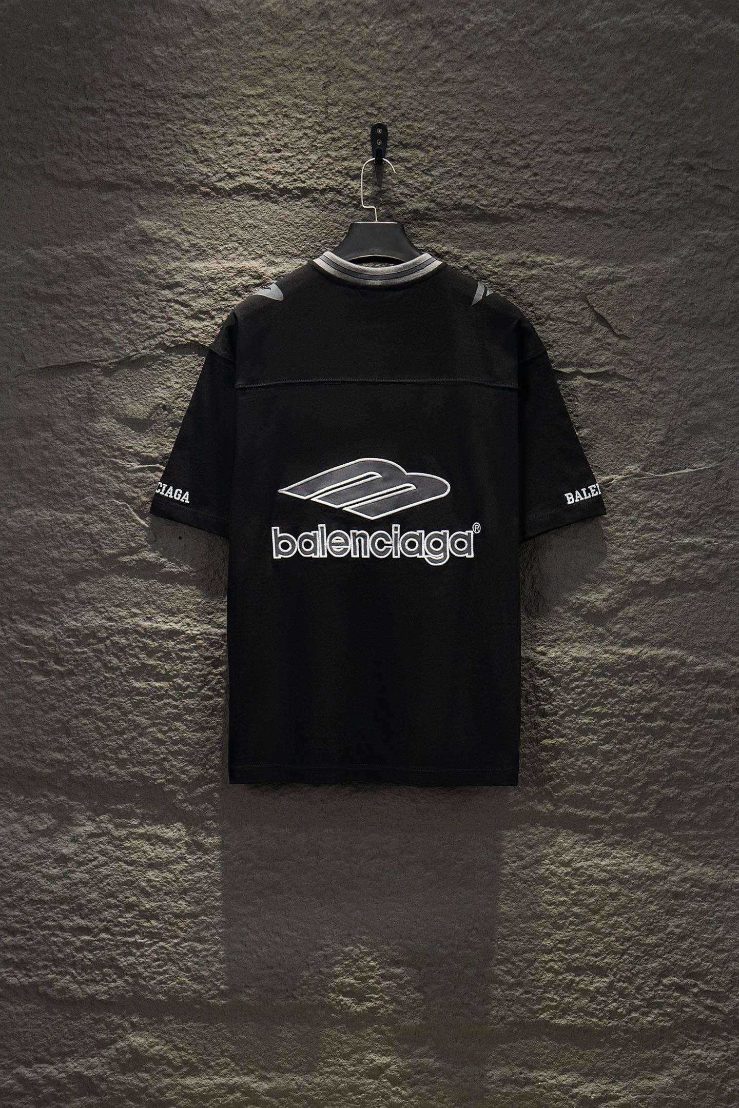 Balenciaga black short-sleeve polo shirt with front logo and sleeve logos
