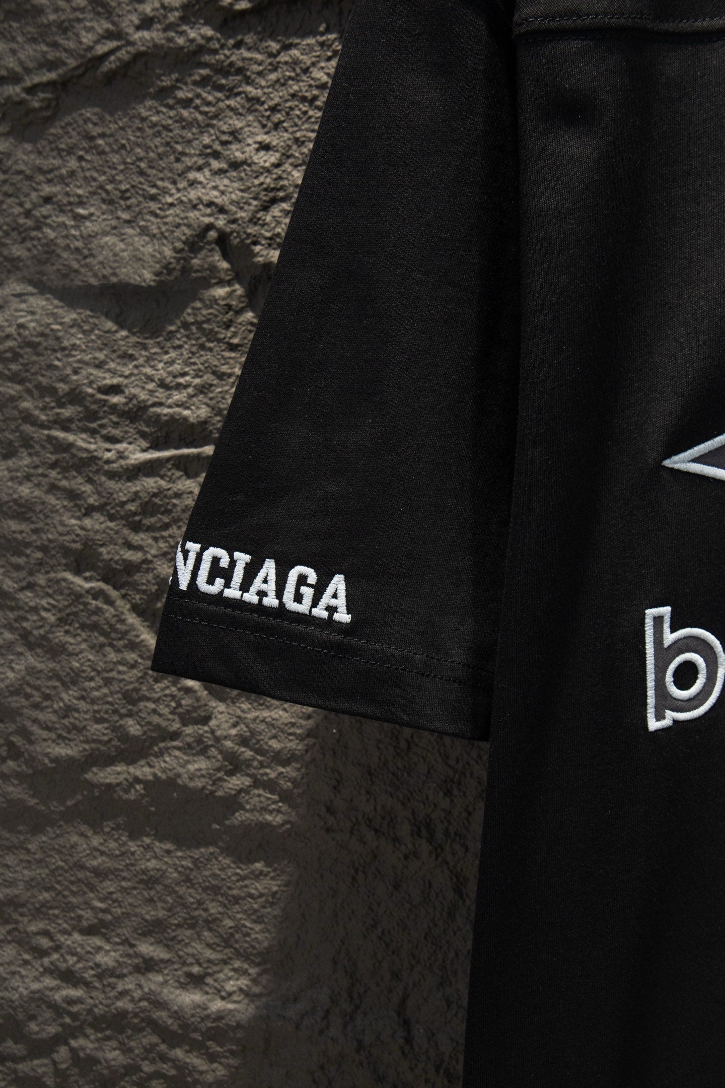 Balenciaga black polo shirt sleeve with logo print on cuff