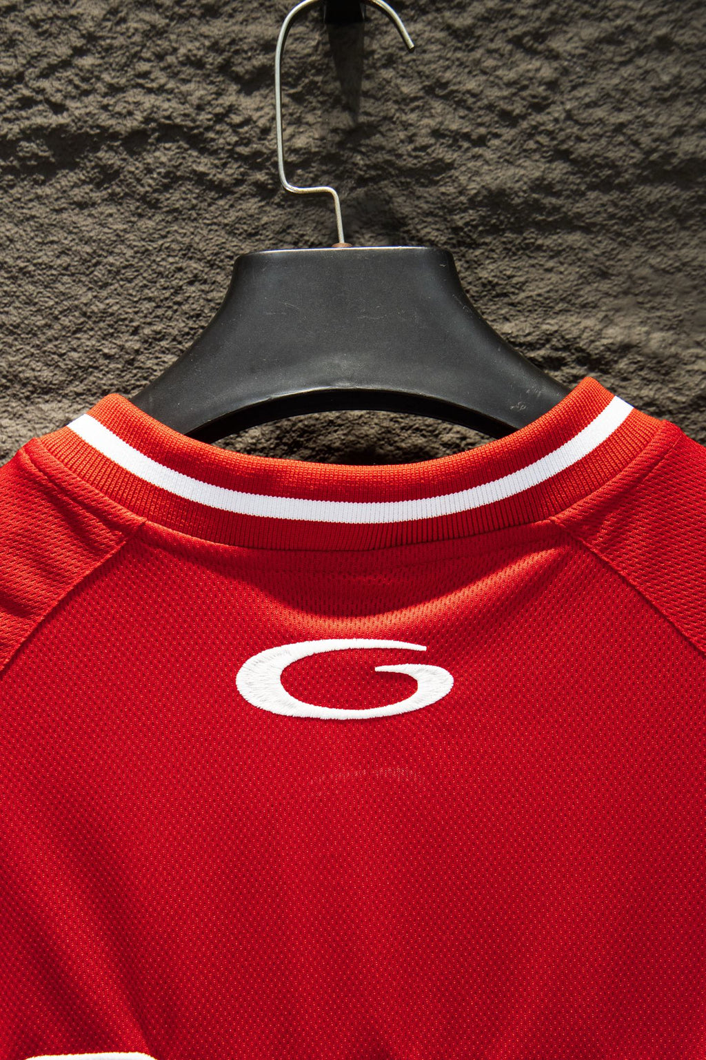 Red Balenciaga jersey neckline with ribbed white trim and small oval G logo